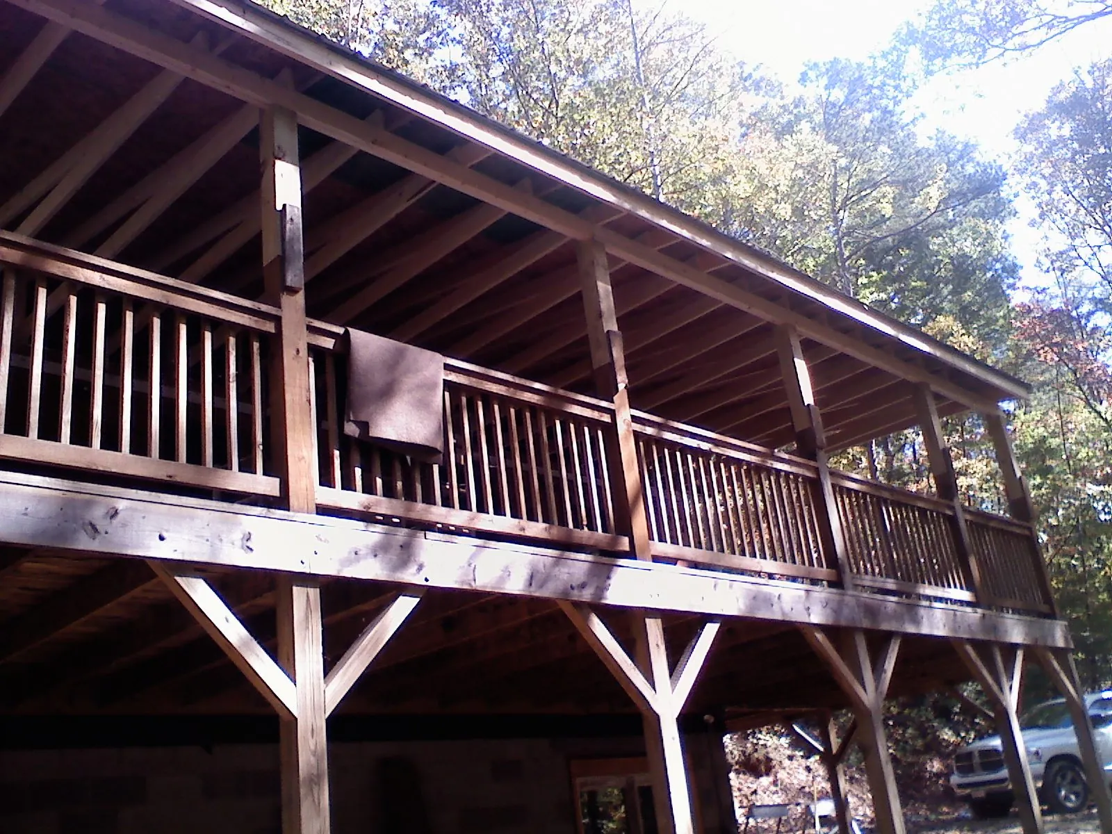 Timber framing under a new elevated porch and deck — Roof Leak Repair in Turlock by Roofing Brothers